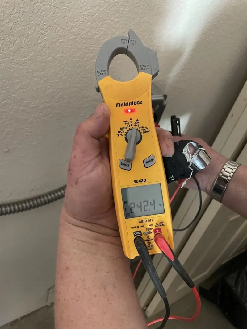 Voltage testing with clamp meter during Electrical Installation Services in Peotone